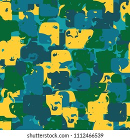 A seamless color pattern composed of torn spots. Texture in camouflage style. Fashionable wallpaper. 