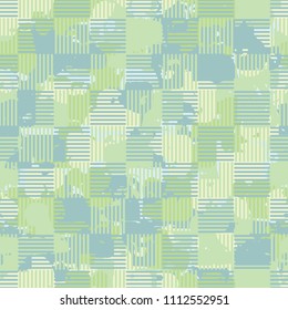 A seamless color pattern composed of torn spots. Texture in camouflage style. Fashionable wallpaper. Chess network formed by squares consisting of horizontal and vertical segments.