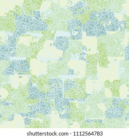 A seamless color pattern composed of torn spots. Texture in camouflage style. Fashionable wallpaper. A dense network formed by thin lines.