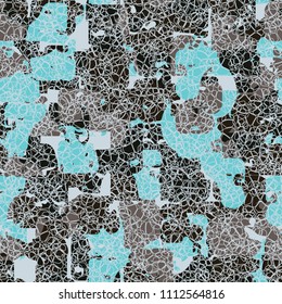 A seamless color pattern composed of torn spots. Texture in camouflage style. Fashionable wallpaper. A dense network formed by thin lines.
