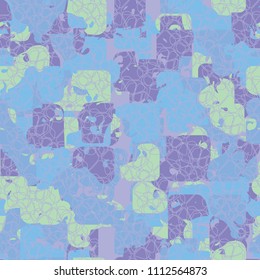 A seamless color pattern composed of torn spots. Texture in camouflage style. Fashionable wallpaper. Interlacing of many rounded elements.