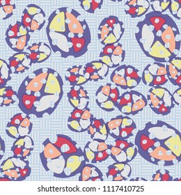 Seamless color pattern made up of multi-colored rounded elements with holes. The picture is superimposed on the background consisting of mutually perpendicular segments forming the chess order.