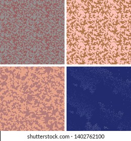 Seamless colored grunge pattern. Grainy texture. Vector set of 4.