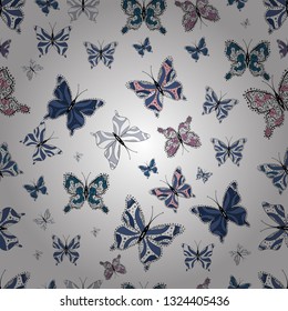 Seamless colorfil pattern. Hand drawing on a black, white and blue background. Repeated doodles. Mystical, symbols.