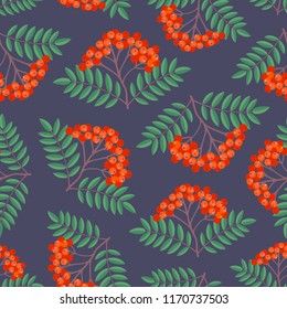 Seamless colorful autumn pattern with rowan berries and green leaves on a dark background. Floral rowan illustration for print.