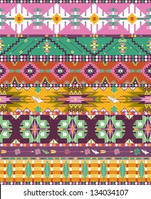 Seamless colorful aztec geometric pattern with birds and arrows