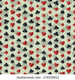 Seamless colorful background made of card suit in flat design