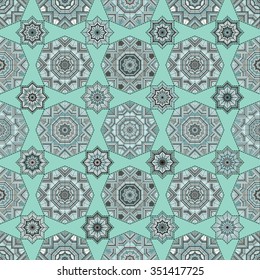 Seamless colorful decorative vector background with geometric mosaic shapes