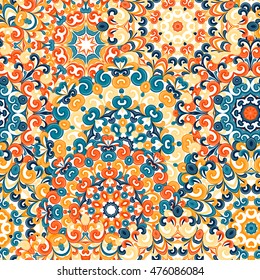 Seamless colorful ethnic pattern with mandalas in oriental style. Round doilies with blue, yellow, orange curls and swirls weaving in arabesque traditional lace ornament. Vector illustration.
