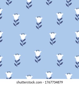Seamless colorful floral pattern with wild flowers on blue background. Simple scandinavian style. Vector illustration