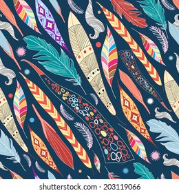 seamless colorful graphic pattern of leaves and feathers  