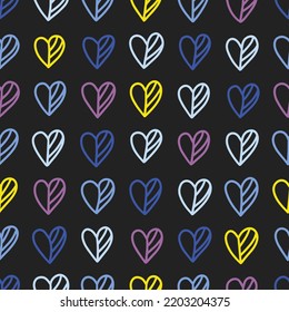 Seamless colorful hearts pattern. Abstract background with hand drawn doodle shapes.