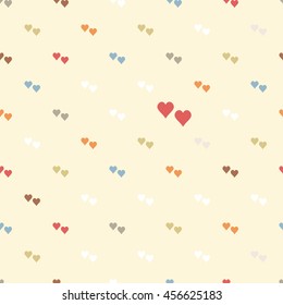 Seamless colorful hearts pattern on light background