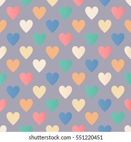 Seamless colorful hearts pattern on gray background