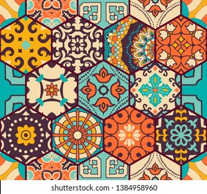 Seamless colorful patchwork tile with Islam, Arabic, Indian, Ottoman motifs. Majolica pottery tile. Portuguese and Spain decor. Azulejo. Ceramic tile in talavera style. Boho pattern