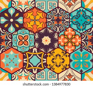 Seamless colorful patchwork tile with Islam, Arabic, Indian, Ottoman motifs. Majolica pottery tile. Portuguese and Spain decor. Azulejo. Ceramic tile in talavera style. Boho pattern