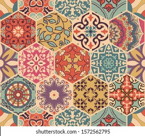 Seamless colorful patchwork tile with Islam, Arabic, Indian, African motifs. Majolica pottery tile. Portuguese and Spain decor. Gaudi mosaic. Ceramic tile in talavera style. Vector illustration
