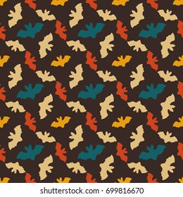 Seamless colorful pattern. Abstract halloween wallpaper. Vector background illustration with bats