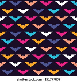 Seamless colorful pattern with bats in vector