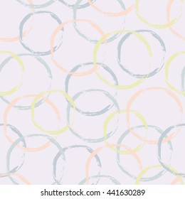 Seamless colorful pattern with grunge painted circles. Multicolored abstract texture with different rings. Seamless texture with round shapes. 