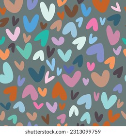 Patrón colorido sin inconfundible con corazones de fondo gris. Vector.