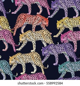 Seamless composition of multicolor wild animals leopards on a dark blue background. Fashion pattern wallpaper