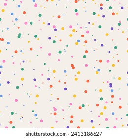 Seamless confetti pattern with dots. Rainbow bolts. Vector carnival background for the holiday. Abstract colorful splatter. For print templates or textiles.