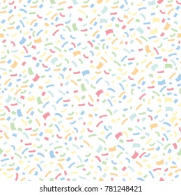 Seamless confetti pattern in pastel colours on white background. Vector illustration. Great for envelopes, wrapping paper, gifts etc.