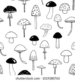 Seamless contour black and white pattern with mushrooms. Vector Wallpapers.