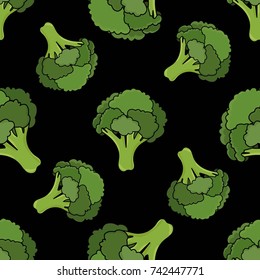 Seamless contrast black pattern with green fresh broccoli. Broccoli in cartoon style.Vector illustration.