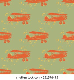Seamless contrast colorful bight pattern with linocut vintage planes and ink drops