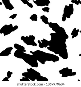 Seamless cow skin pattern. Animal skin in vector. Printing on clothing, dress, fabric, background printing. Seamless colorful cow pattern. Vector image. Safari texture, zoo.