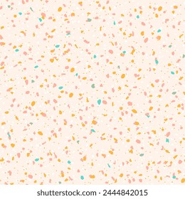 Seamless cream pastel terrazzo pattern. Pink, cream, mint blue and mustard yellow terrazzo texture speckled background. Soft pastel spring backdrop.