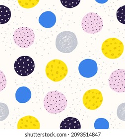 Seamless creative dotted circles pattern. Simple irregular doodle textured background.