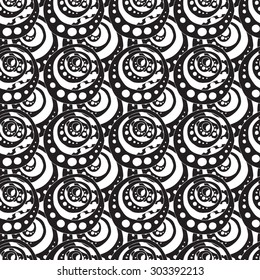 Seamless creative hand-drawn abstract pattern composed of circular elements in black and white colors. Vector illustration.