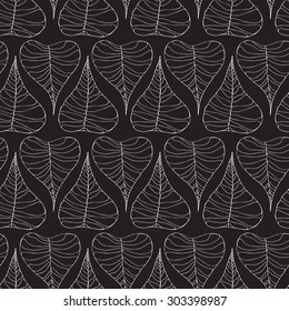 Seamless creative hand-drawn pattern composed of stylized leaves in black and white colors. Vector illustration.