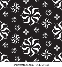 Seamless creative hand-drawn pattern composed of stylized flowers in black and white colors. Vector illustration.