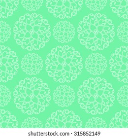 Seamless creative hand-drawn pattern composed of stylized flowers in pale green and lime colors. Vector illustration. 