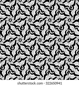 Seamless creative hand-drawn pattern composed of wavy abstract elements in black and white colors. Vector illustration.