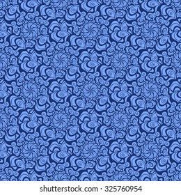 Seamless creative hand-drawn pattern composed of stylized flowers in cornflower blue and ultramarine colors. Vector illustration.