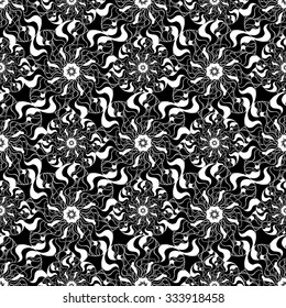 Seamless creative hand-drawn pattern of stylized flowers in black and white colors. Vector illustration.