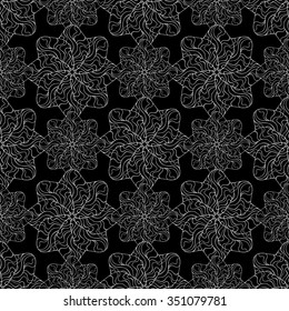 Seamless creative hand-drawn pattern of stylized flowers in black and white colors. Vector illustration.