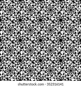 Seamless creative hand-drawn pattern of stylized flowers in black and white colors. Vector illustration.