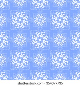 Seamless creative hand-drawn pattern of stylized flowers in cornflower blue and white colors. Vector illustration.