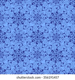 Seamless creative hand-drawn pattern of stylized flowers in cornflower and cerulean blue colors. Vector illustration.