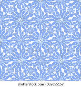 Seamless creative hand-drawn pattern of stylized flowers in cornflower blue and white colors. Vector illustration.