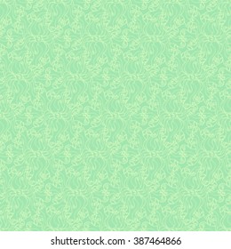 Seamless creative hand-drawn pattern of stylized flowers in light yellow-green and pale lime colors. Vector illustration.