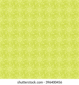 Seamless creative hand-drawn pattern of stylized flowers in yellow-green and olive colors. Vector illustration.