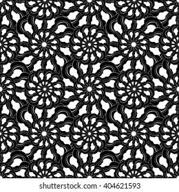 Seamless creative hand-drawn pattern of stylized flowers in black and white colors. Vector illustration.
