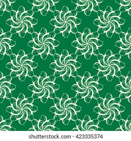 Seamless creative hand-drawn pattern of stylized flowers in light yellow and dark green colors. Vector illustration.